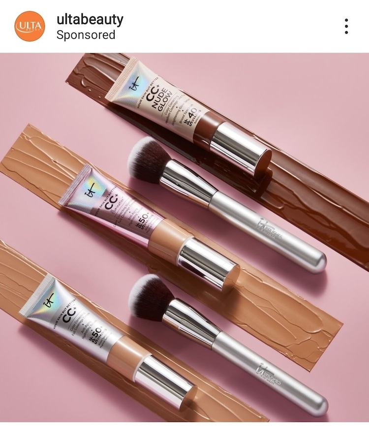 Ulta Beauty CC+ Nude Glow foundation tubes with brushes on pink background, showcasing product shades.