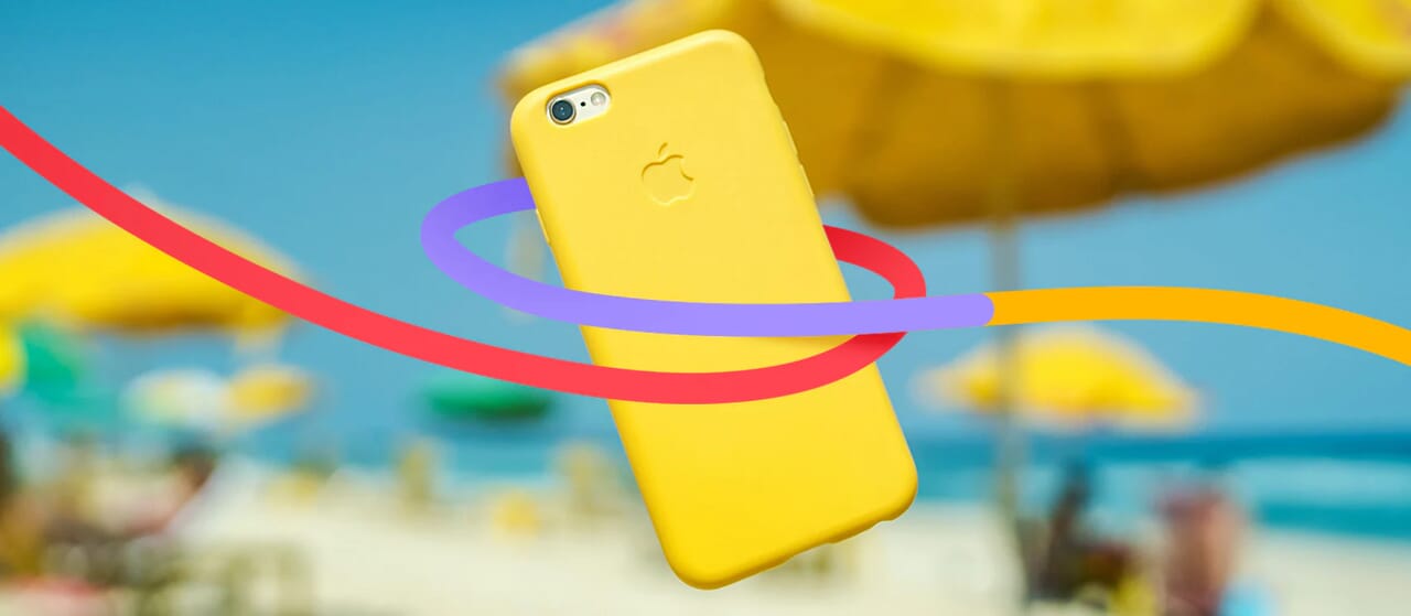 Bright yellow iPhone case floating in front of a beach scene with yellow umbrellas, accented by colorful design lines.