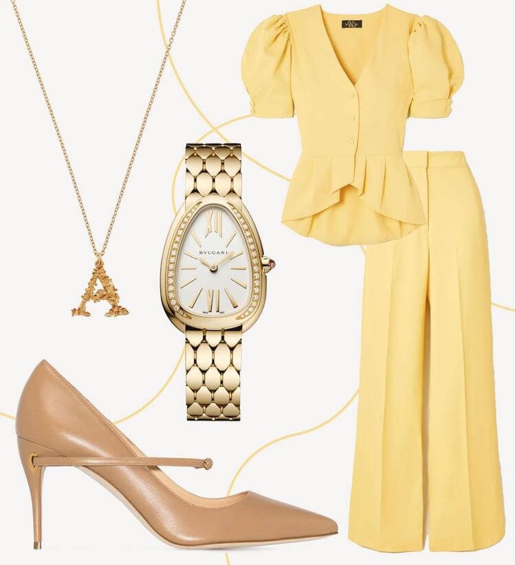 Elegant yellow blouse and pants paired with Bulgari watch, pendant necklace, and nude heels.