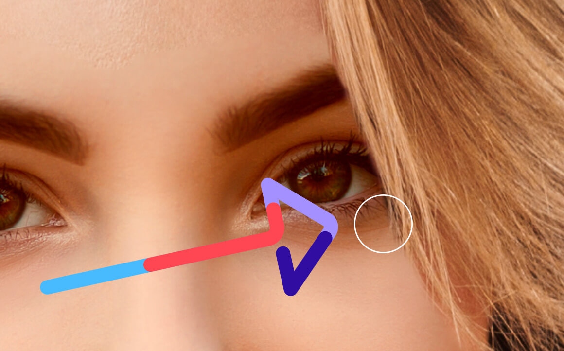 Close-up of eye in Photoshop with small brush tool for precise retouching