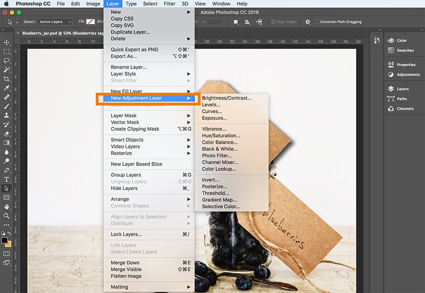 Photoshop Layer menu with "New Adjustment Layer" option highlighted for color and tone adjustments