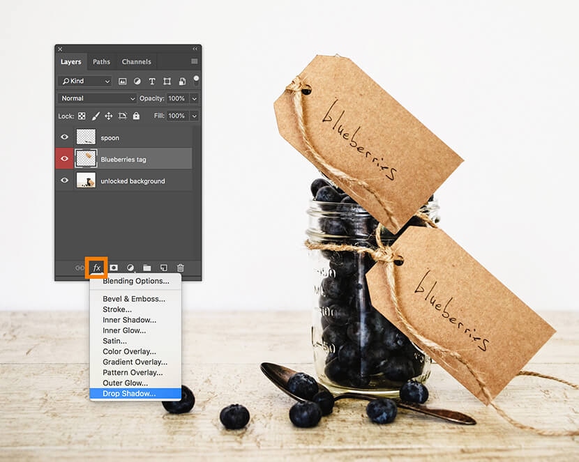 Photoshop Layers panel with "Drop Shadow" effect selected for the "Blueberries tag" layer