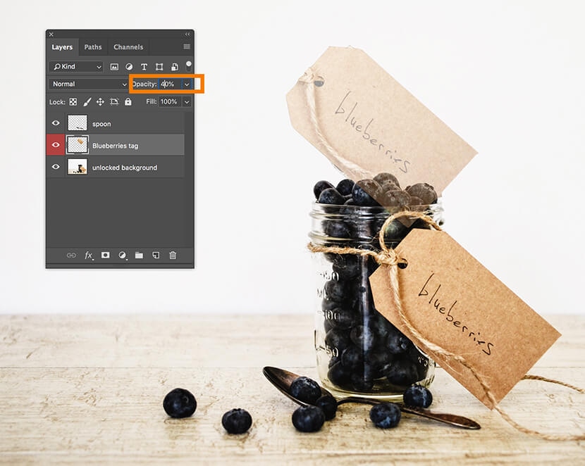 Photoshop Layers panel showing opacity adjustment set to 40% on "Blueberries tag" layer