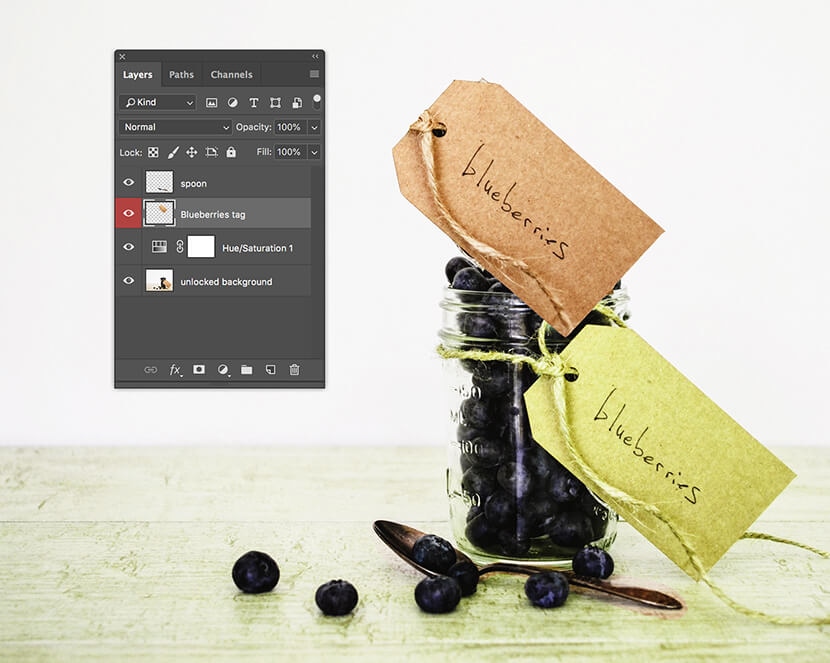 Photoshop Layers panel with Hue/Saturation adjustment applied, changing tag color