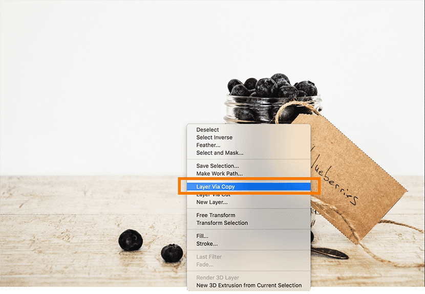 Photoshop context menu showing "Layer via Copy" option to duplicate a selection
