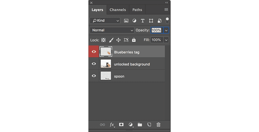 Photoshop Layers panel with "Blueberries tag" layer labeled in red for easy organization