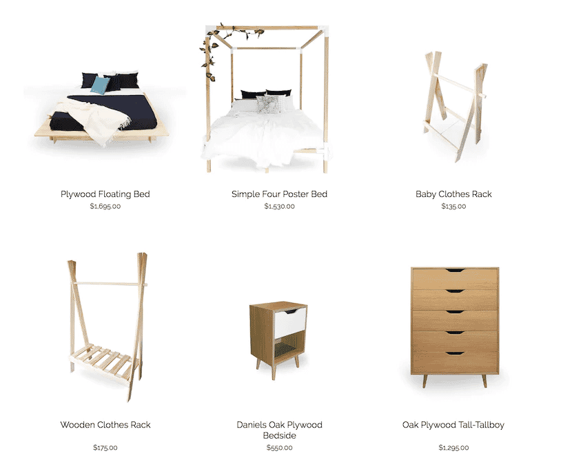 Display of minimalist wooden furniture including beds, clothes racks, bedside table, and tallboy dresser