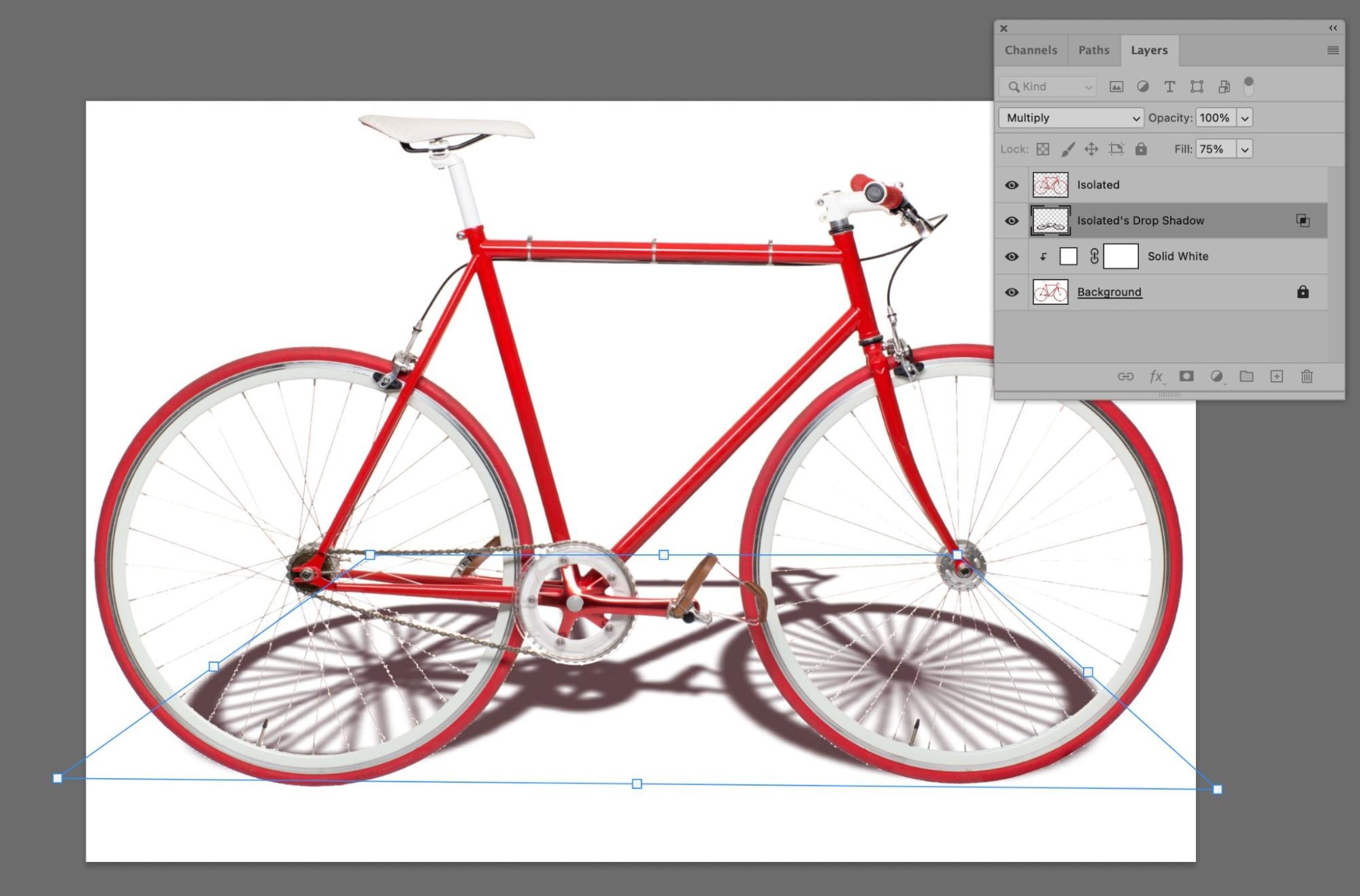 Red bicycle in Photoshop with distorted drop shadow effect applied