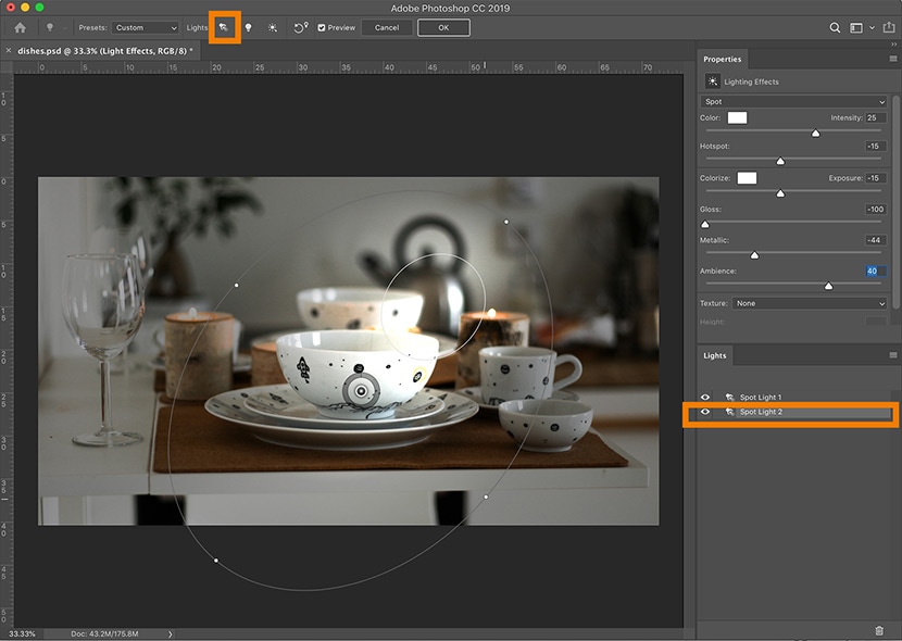 Photoshop interface with multiple spotlight layers applied to a tableware photo, showing intensity and ambiance adjustments.