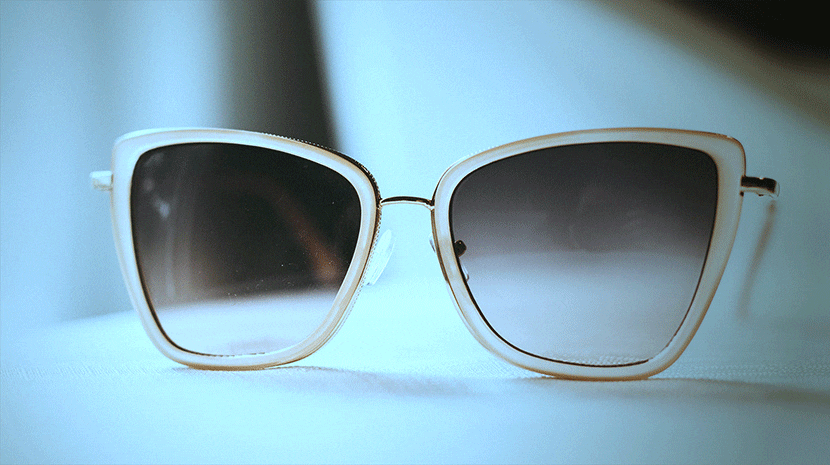 Photo of sunglasses with a cool-toned vintage effect, showcasing subtle blue color adjustments for a retro-inspired look.