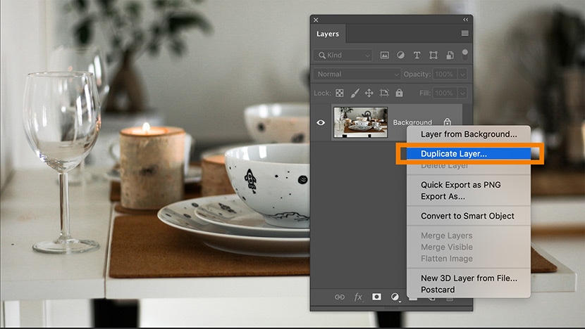 Photoshop screenshot showing "Duplicate Layer" option selected for a tableware photo, featuring plates, cups, and candles on a table.