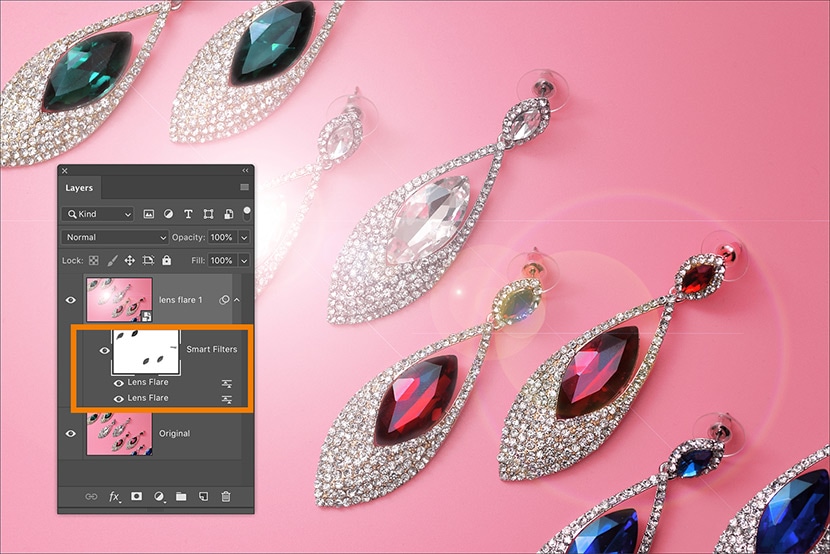 Photoshop layers panel with lens flare effect masked for selective enhancement on jewelry earrings with gemstones on a pink background.