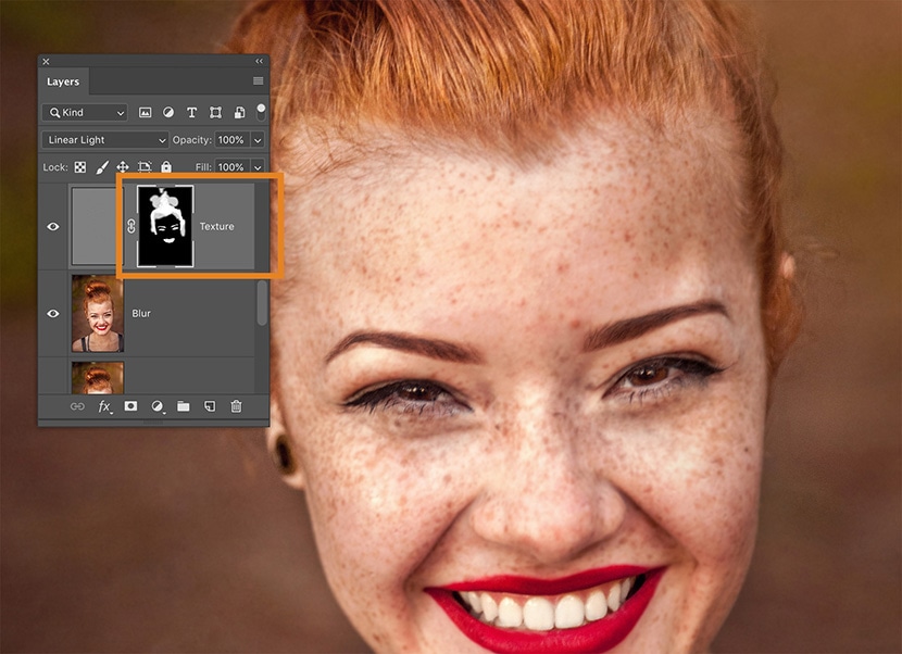Layer mask applied on texture layer in Photoshop for enhanced skin texture in frequency separation.