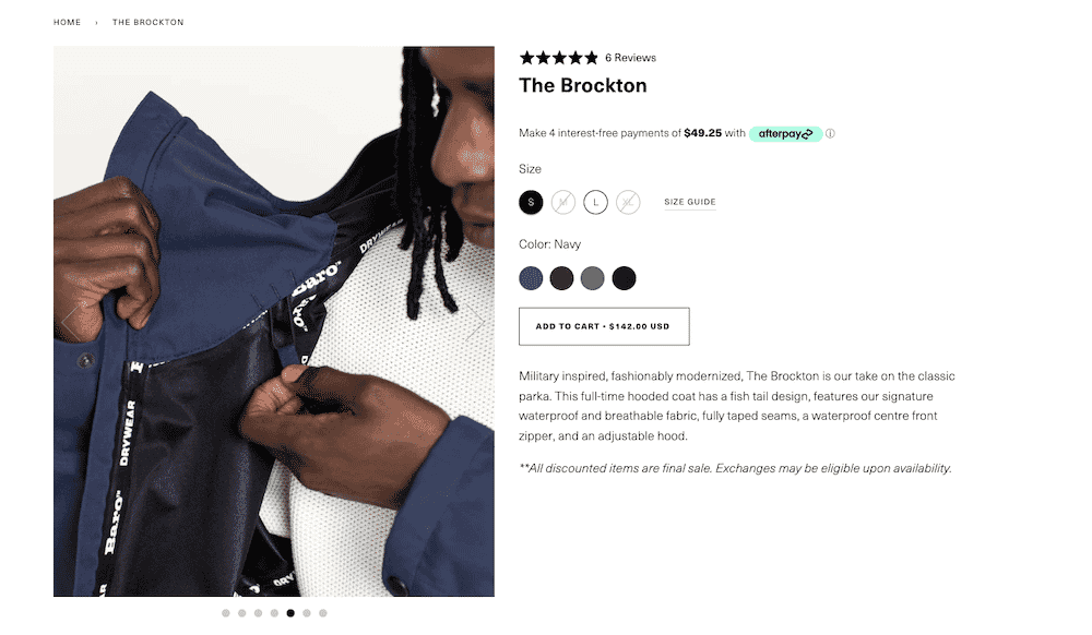 Model showing the interior details of The Brockton navy parka, displayed on Baro's product page.