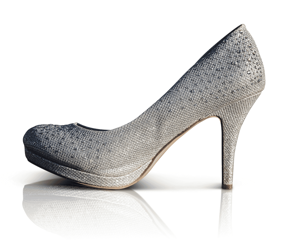 Elegant silver high heel shoe with a reflective shadow effect on a white background.