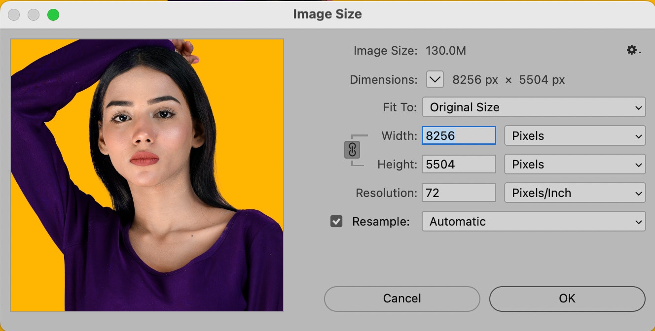 Close-up of a female model with smooth skin and bold lipstick against a solid yellow background, shown within Photoshop's image resize settings dialog at ultra-high resolution of 8256 by 5504 pixels, suitable for detailed retouching and background removal.