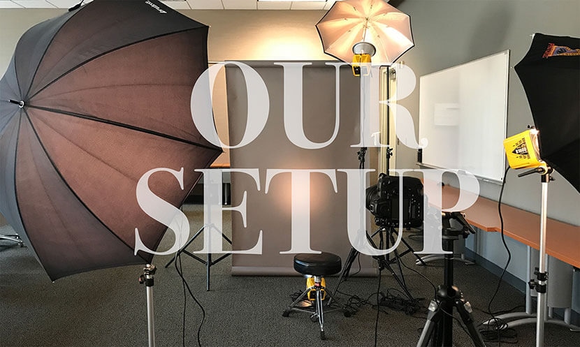 Studio photography setup with lighting equipment, backdrop, and camera for product shoots.