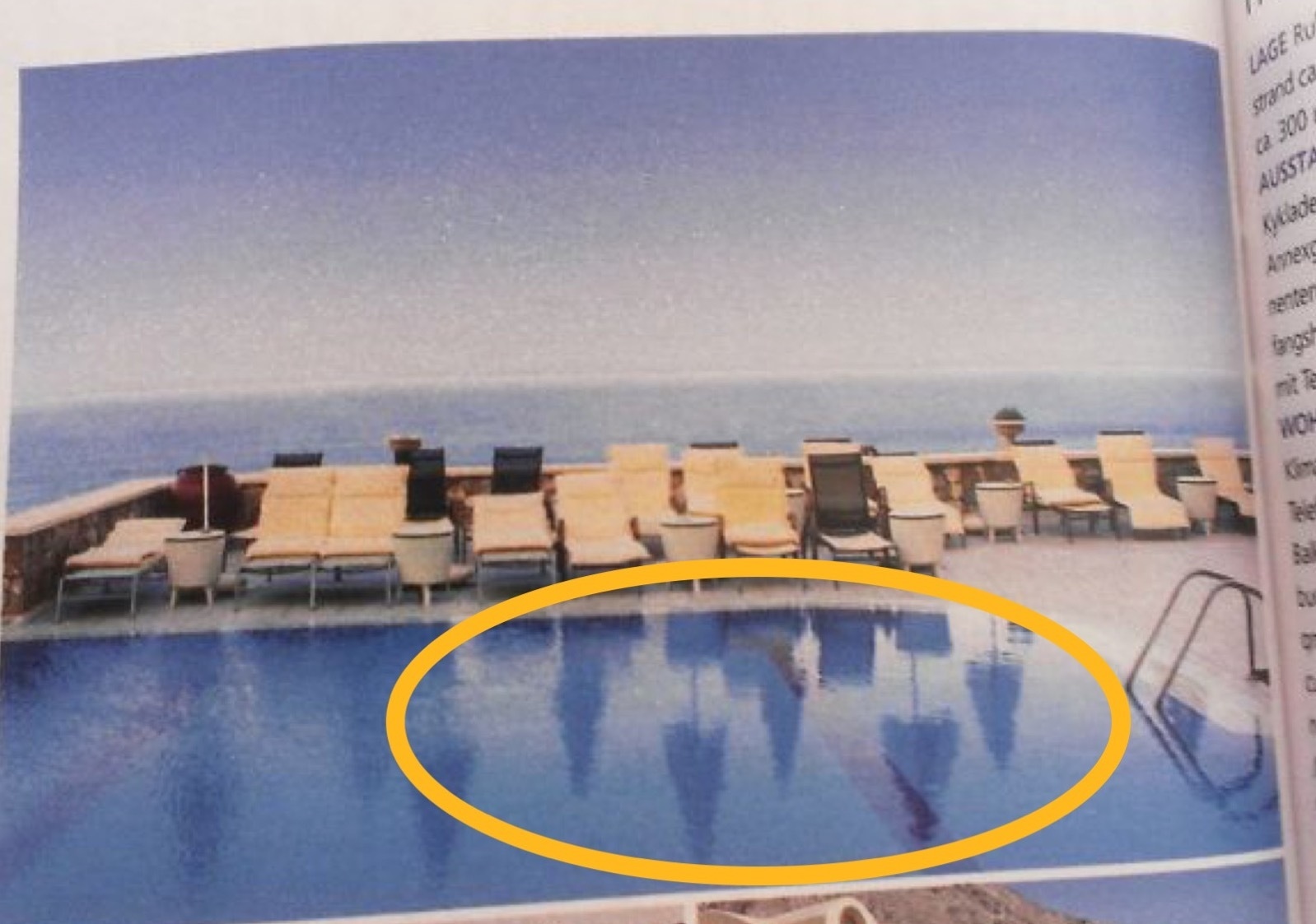 Resort ad with Photoshop fail showing inconsistent lounge chair reflections in pool, emphasizing editing error.