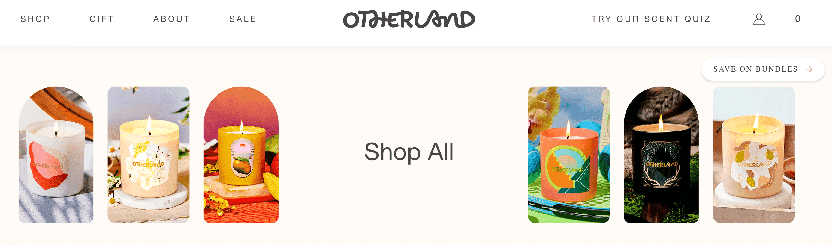 Assorted Otherland candles in various designs and colors, perfect for creating a cozy ambiance.