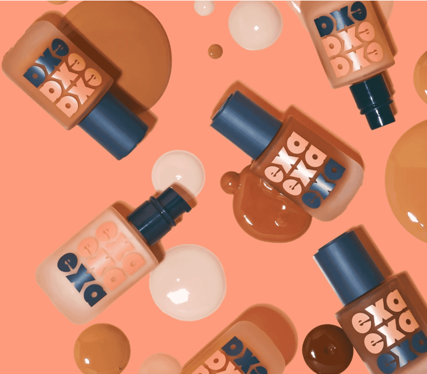 Exa Beauty foundation bottles in various shades on a peach background, with foundation drops showcasing color diversity.